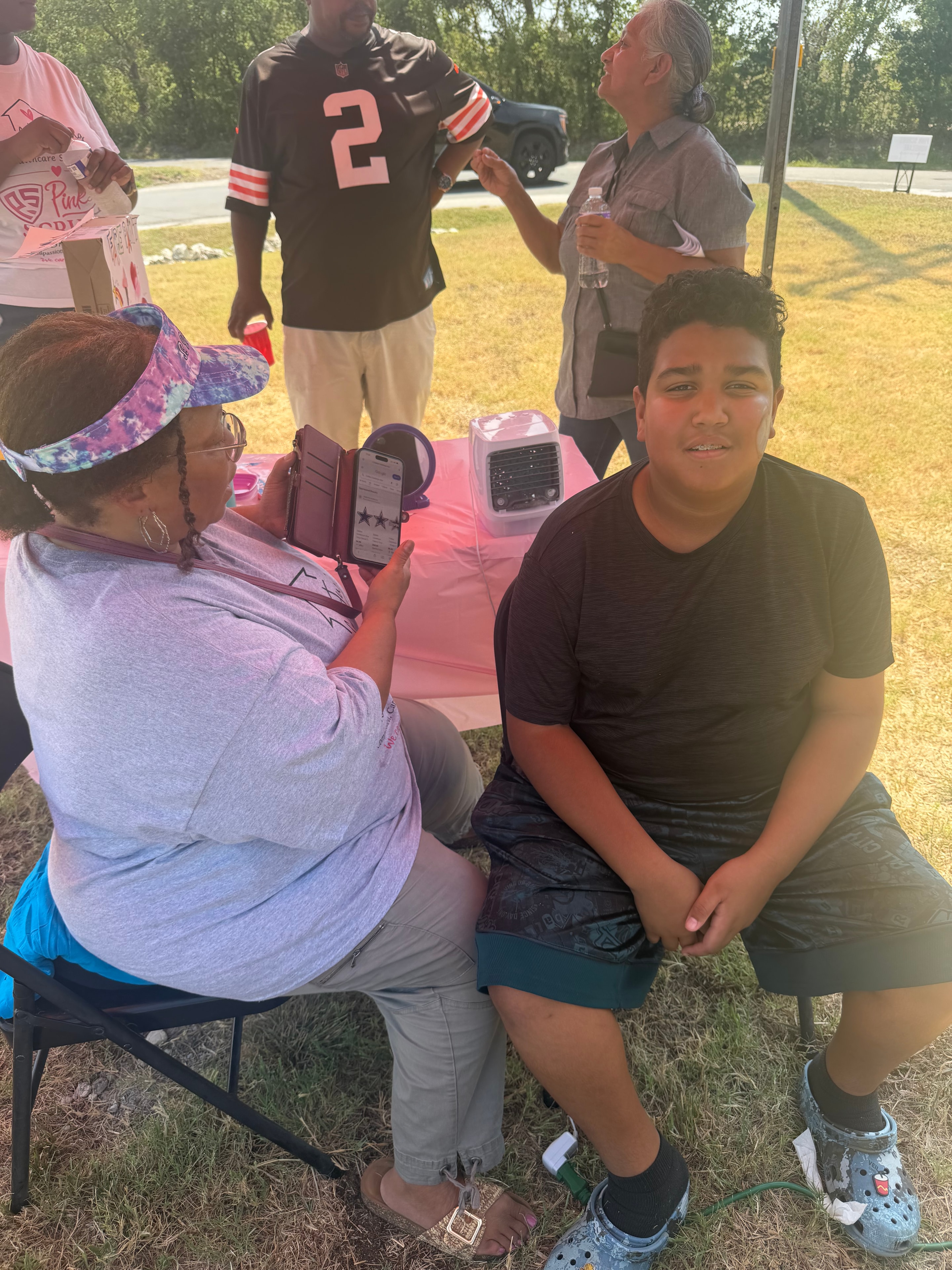 Community members at outdoor health fair